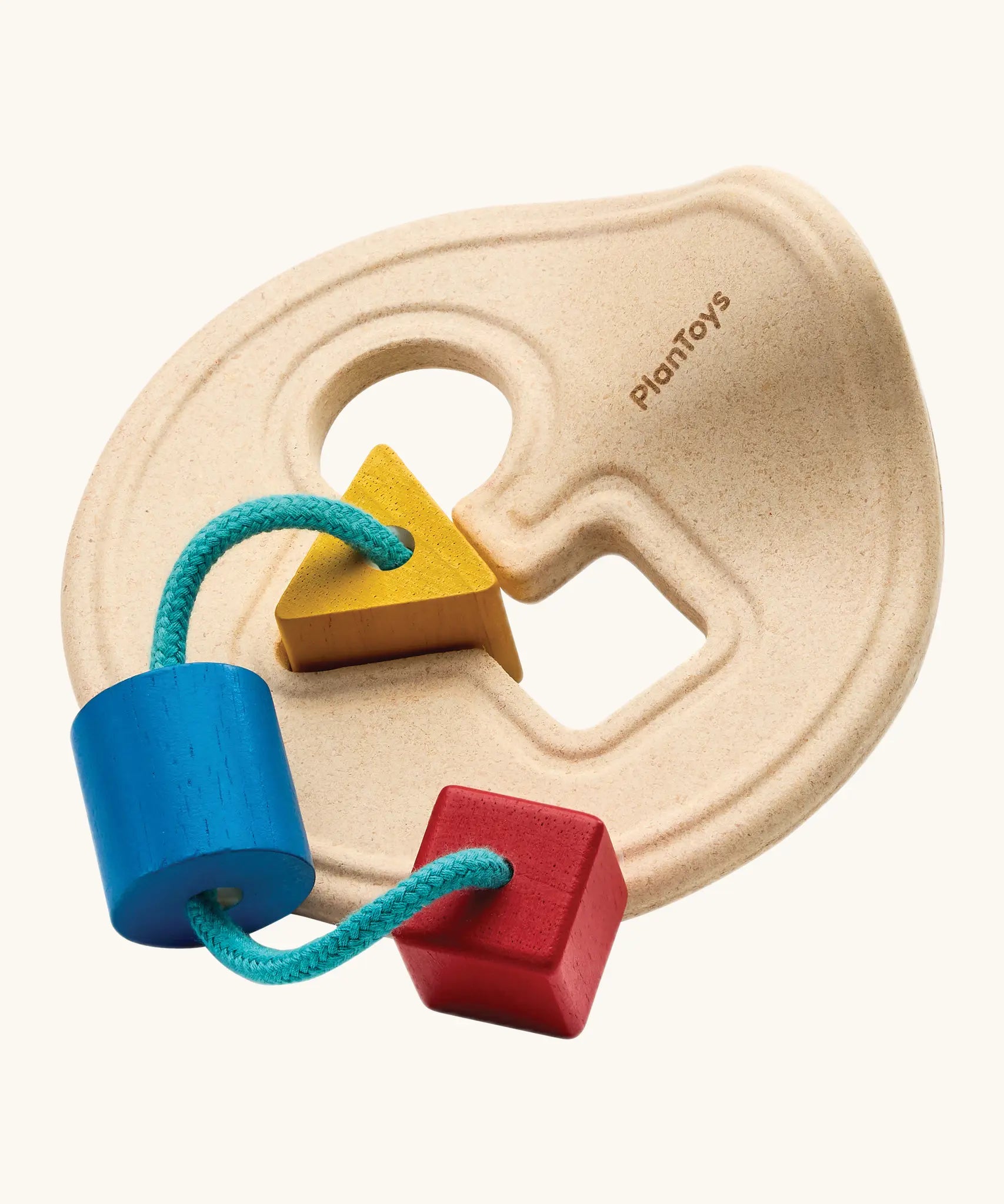 PlanToys first shape sorter wooden baby toy. Wood frame with three shapes attached on string, blue cylinder, red cube and yellow triangle. 