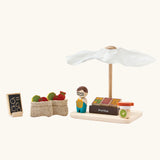 PlanToys Farmer's Market wooden toy playset. Market stall with produce , scales, advert board, mini jute bags and worker.