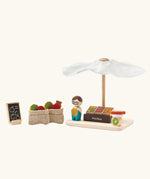 PlanToys Farmer's Market wooden toy playset. Market stall with produce , scales, advert board, mini jute bags and worker.