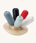 PlanToys Flexi Jellyfish wooden high contrast baby toy. A wooden top with high contrast, white, greys, black and red flexible wooden pieces for the jellyfish legs. PlanToys range of toys are made from sustainably sourced rubberwood, we're proud stockists of PlanToys here at Babipur. 