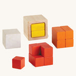 PlanToys Fractions Cubes on a plain background. The cubes are shown out of their packaging. 
