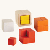 PlanToys Fractions Cubes on a plain background. The cubes are shown out of their packaging. 