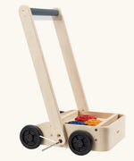 PlanToys gear & go push along wooden baby walker. 