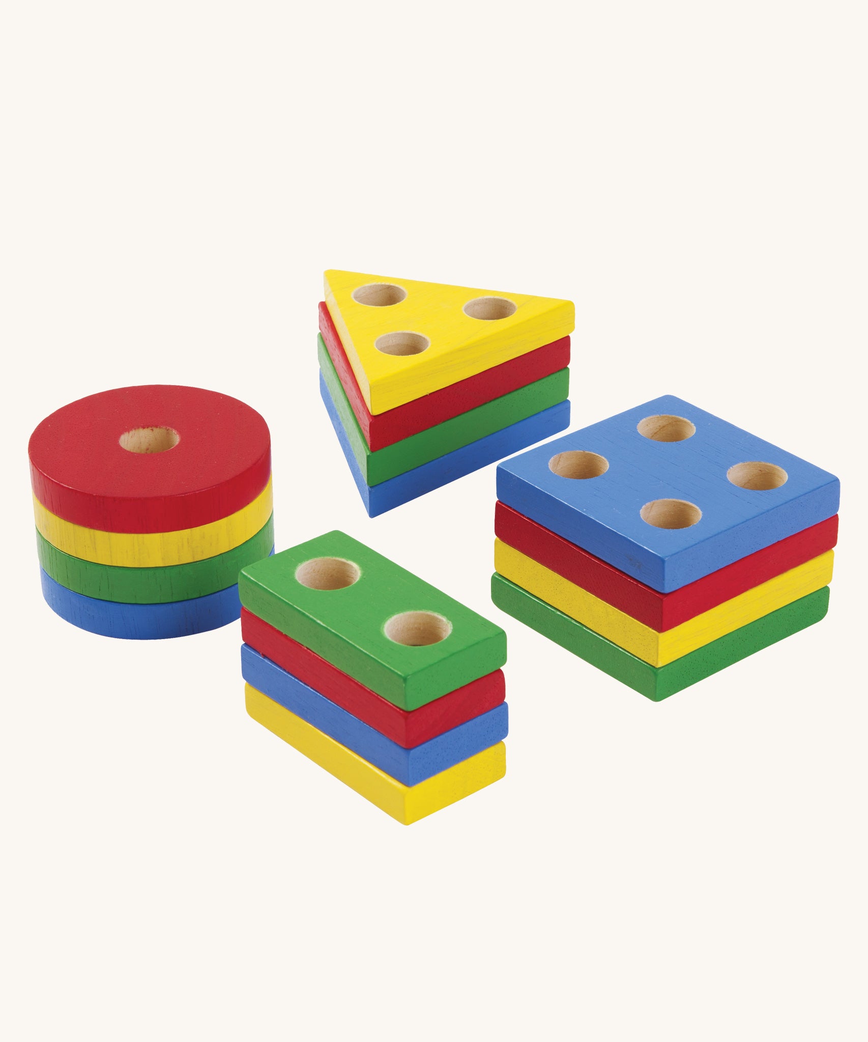 The rainbow coloured shapes from the PlanToys Geometric Sorting Board set. 
