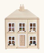 PlanToys wooden Georgian dollhouse children's toy.  Dolls can be seen inside. 