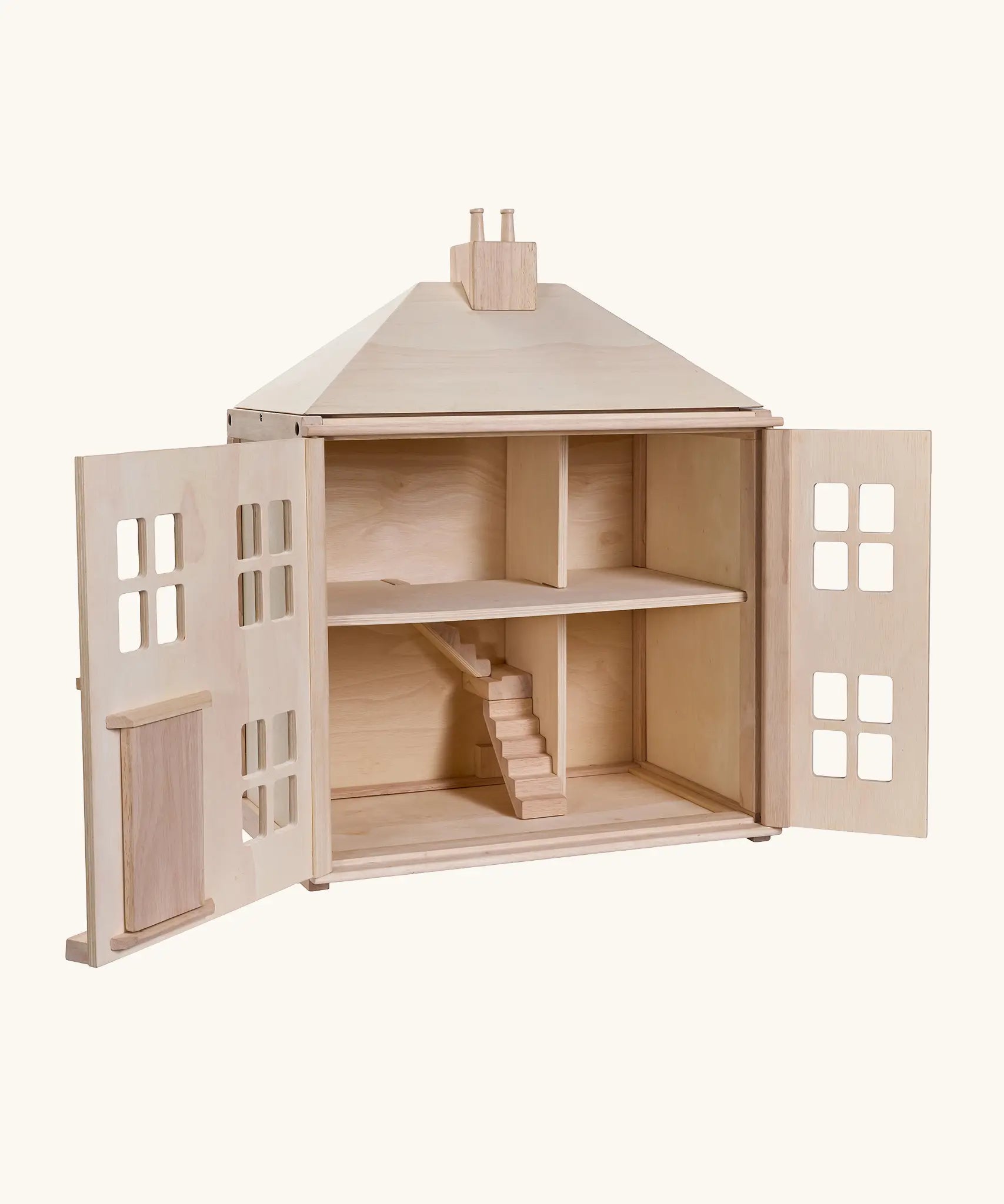 PlanToys wooden Georgian dollhouse children's toy shown with the front walls opened. 