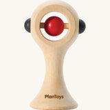 PlanToys Shaking Rattle in a High Contrast colourway. The red and black coloured details stand out against the natural rubberwood body. PlanToys range of toys are made from sustainably sourced rubberwood, we're proud stockists of PlanToys here at Babipur. 