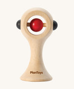 PlanToys Shaking Rattle in a High Contrast colourway. The red and black coloured details stand out against the natural rubberwood body. PlanToys range of toys are made from sustainably sourced rubberwood, we're proud stockists of PlanToys here at Babipur. 