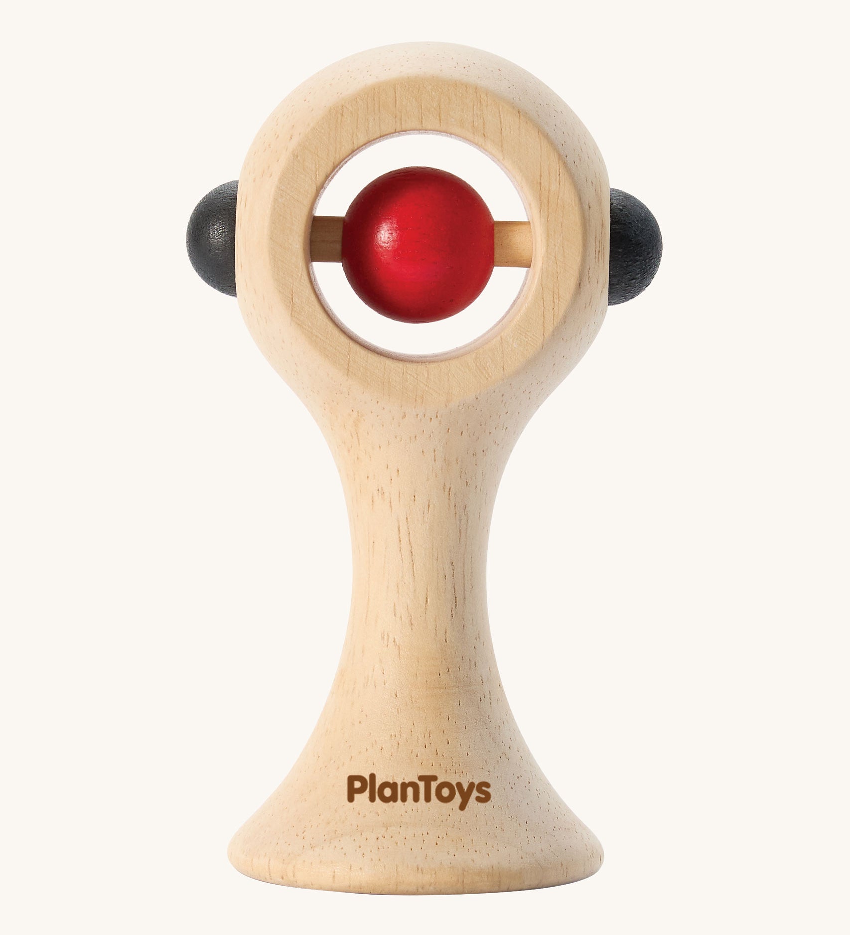 PlanToys Shaking Rattle in a High Contrast colourway. The red and black coloured details stand out against the natural rubberwood body. PlanToys range of toys are made from sustainably sourced rubberwood, we're proud stockists of PlanToys here at Babipur. 