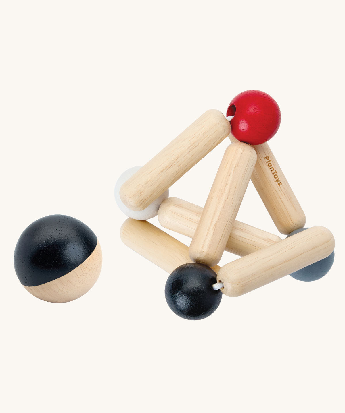 PlanToys high contrast Triangle baby Clutching Toy. A black and natural wood wooden ball with stretchy wooden triangle clutching toy. PlanToys range of toys are made from sustainably sourced rubberwood, we're proud stockists of PlanToys here at Babipur. 