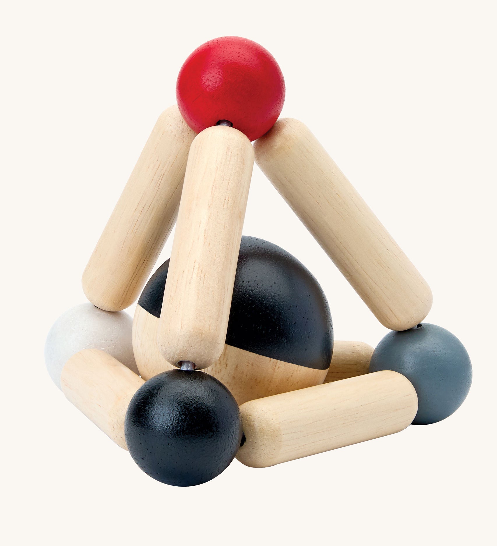 PlanToys high contrast Triangle baby Clutching Toy. A black and natural wood wooden ball in a stretchy triangle clutching toy. PlanToys range of toys are made from sustainably sourced rubberwood, we're proud stockists of PlanToys here at Babipur. 