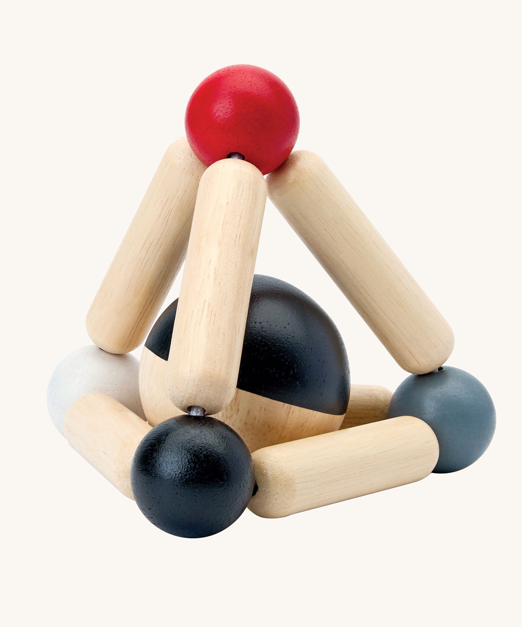 PlanToys high contrast Triangle baby Clutching Toy. A black and natural wood wooden ball in a stretchy triangle clutching toy. PlanToys range of toys are made from sustainably sourced rubberwood, we're proud stockists of PlanToys here at Babipur. 
