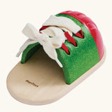 Back of the PlanToys life size tie-up laces wooden shoe children's toy. 