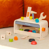 PlanToys little tool bench set shown in a home setting.