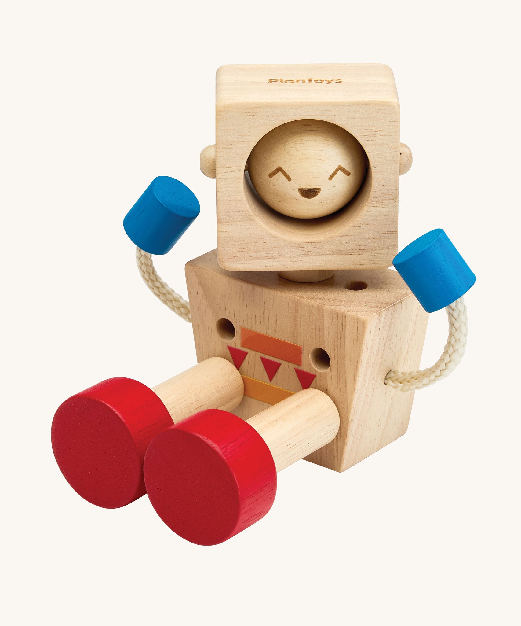 A PlanToys Mood Bot Emotions Wooden Toy Robot placed in a seated position. PlanToys range of toys are made from sustainably sourced rubberwood, we're proud stockists of PlanToys here at Babipur. 