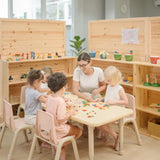 Children playing with the wooden pieces from the PlanToys Mosaic wooden pattern making toy.