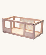 A PlanToys Basement for the My First Dolls' House on a plain background. 
