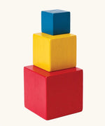 PlanToys nesting boxes. Red, yellow and blue nesting boxes.