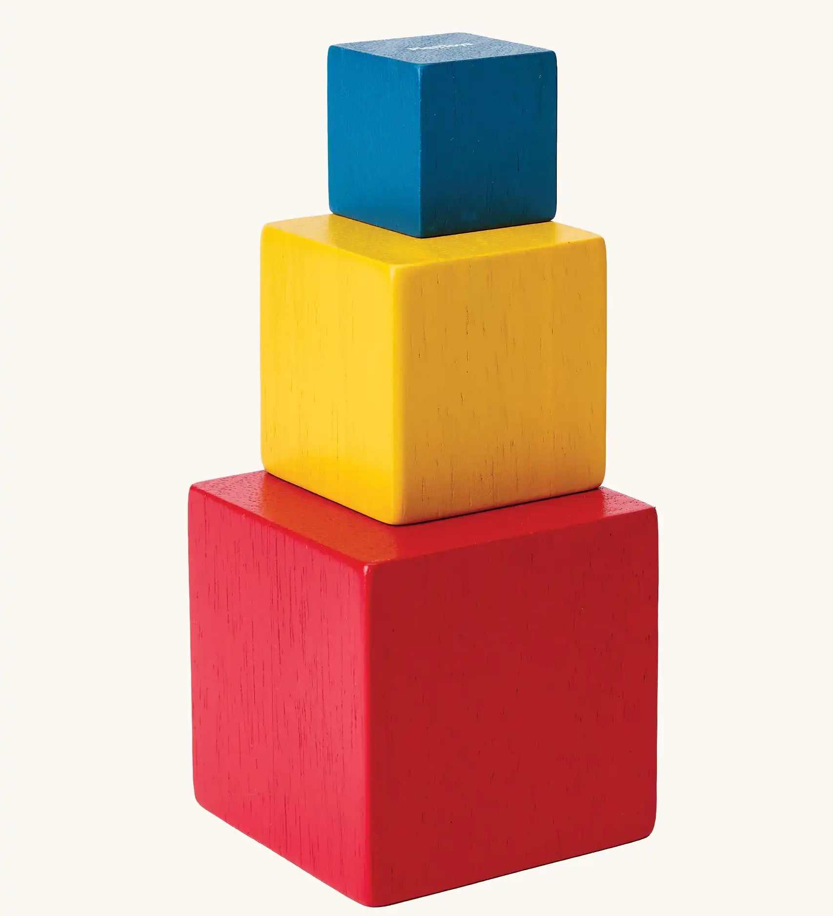 PlanToys nesting boxes. Red, yellow and blue nesting boxes.