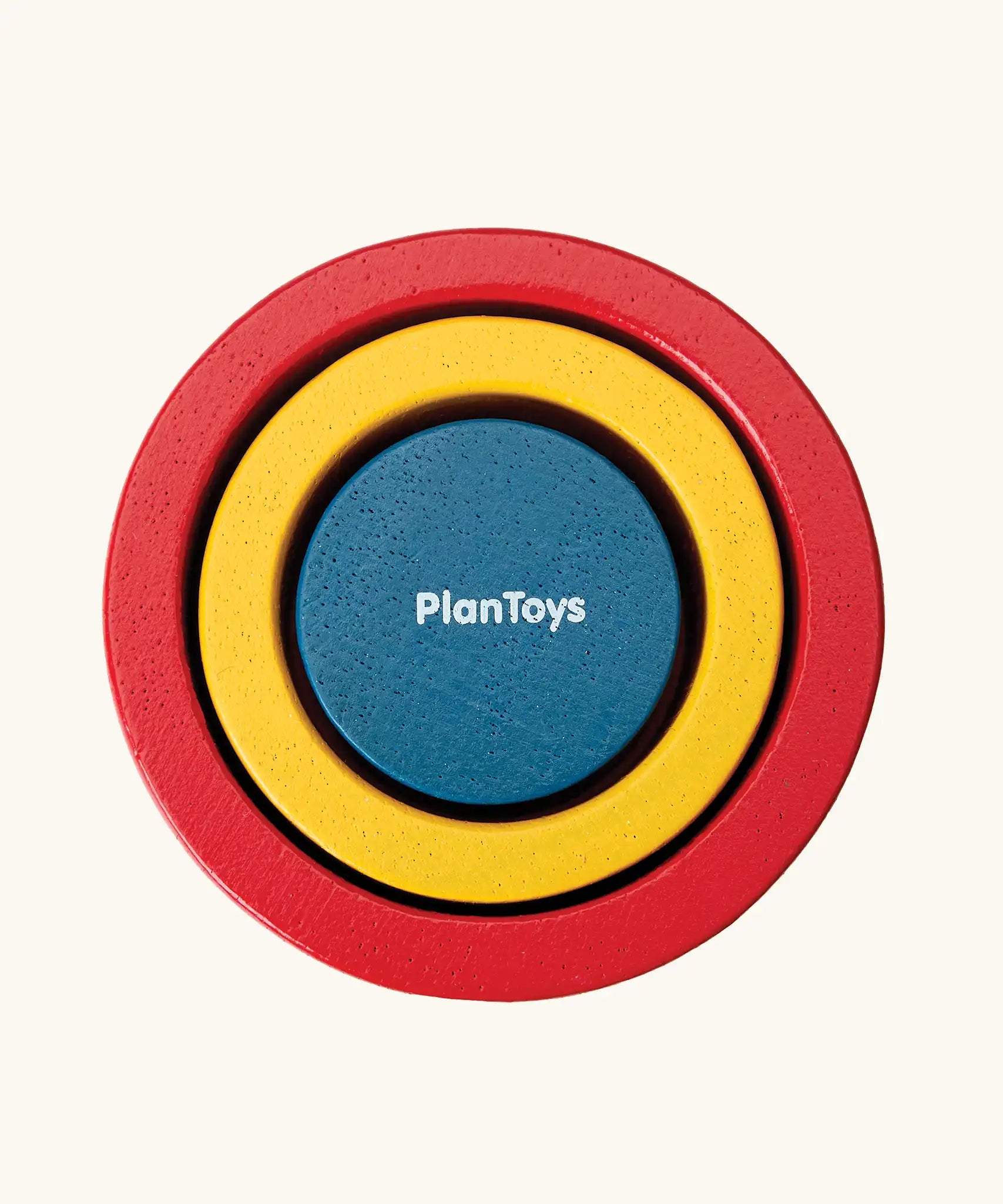 PlanToys Nesting Cylinders 3 piece wooden toy. Red, yellow and blue coloured wooden cylinder shaped wooden pieces that nest inside each other. 