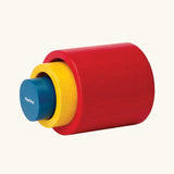 PlanToys Nesting Cylinders 3 piece wooden toy. Red, yellow and blue coloured wooden cylinder shaped wooden pieces that nest inside each other. 