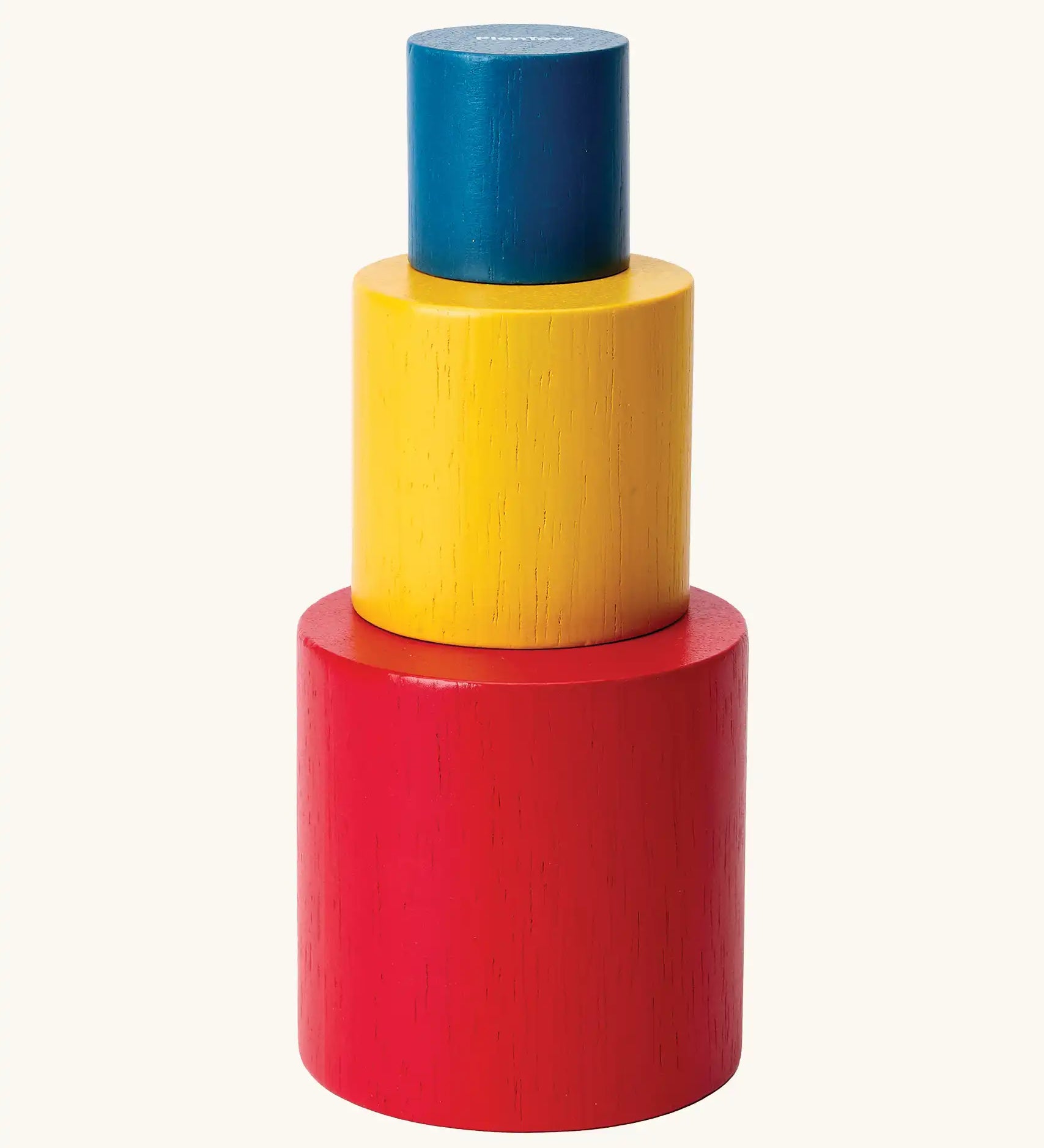 PlanToys Nesting Cylinders 3 piece wooden toy. Red, yellow and blue coloured wooden cylinder shaped wooden pieces that nest inside each other. 