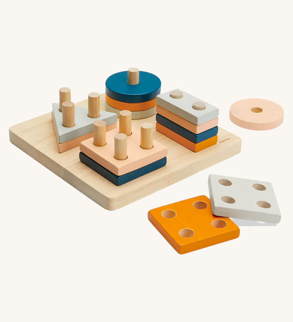 PlanToys Geometric Sorting Board in the Orchard colour way on a plain background. 