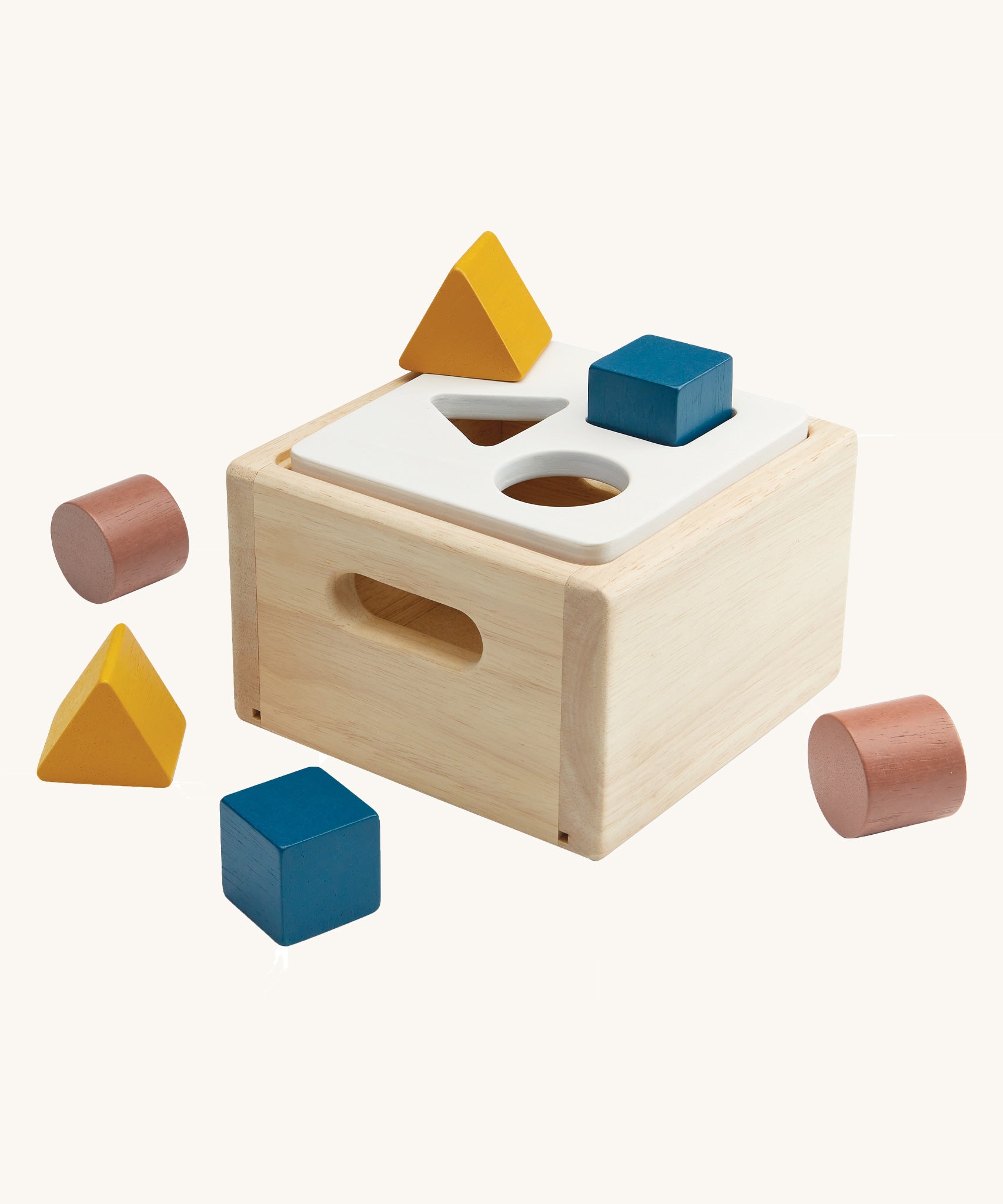 PlanToys Shape & Sort It Out in the Orchard colour way on a plain background. 