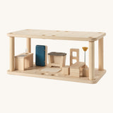 PlanToys wooden space kitchen/dining set Features wooden kitchen accessories including a toy table, lamp, chairs, sink and fridge. This set can be teamed up with the living room and bathroom set to create a dollhouse.