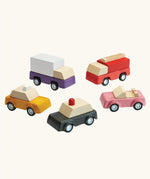 PlanToys PlanWorld vehicle wooden toy vehicles set. Red fire engine, purple truck, yellow taxi, pink convertible and black police car.