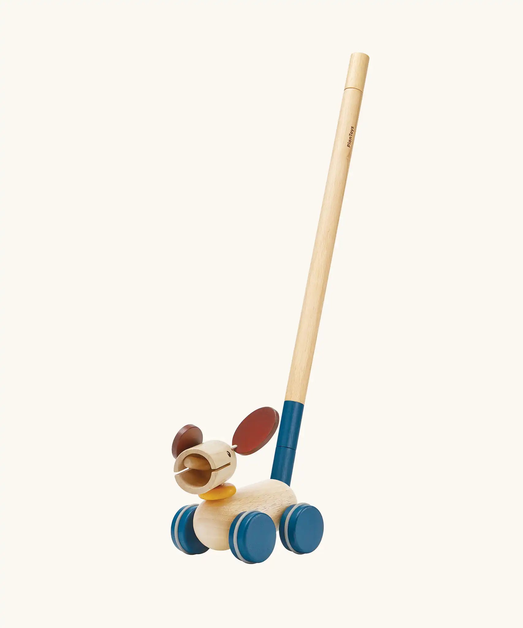 PlanToys push and pull puppy wooden toy with the push along stick attachment attached. 