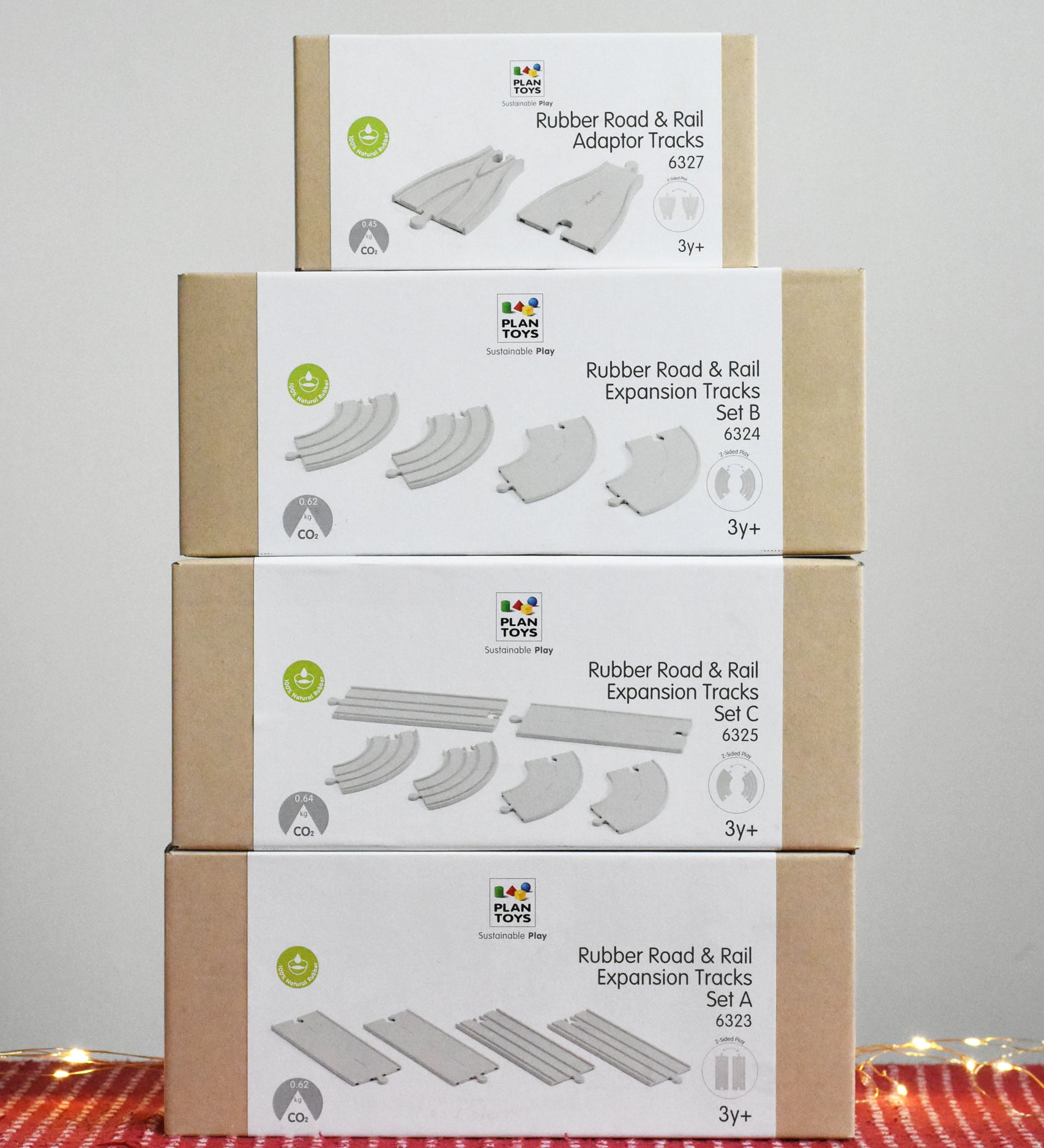 PlanToys Rubber Road and Rail Extension Set - Large. A set of four PlanToys road and rail expansion packs.