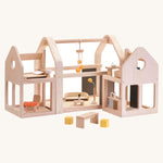 PlanToys Slide N Go Dolls' House on a plain background. 