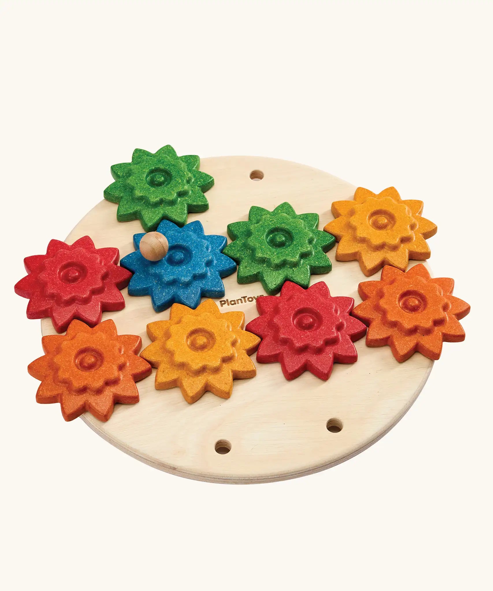 PlanToys spinning gear wooden toy playset. Wooden base with 9 coloured gears.