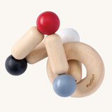 PlanToys Square Clutcher wooden baby toy. A square stretchy shape made of wooden pieces and white, grey, black and red coloured balls. PlanToys range of toys are made from sustainably sourced rubberwood, we're proud stockists of PlanToys here at Babipur. 