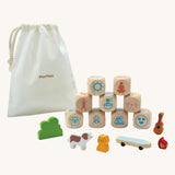 The PlanToys Storytelling Dice Set on a plain background. 