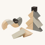 The PlanToys Twisted Blocks stacked up on a plain background. 