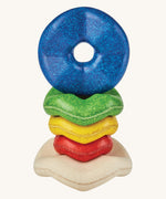 The Plan Toys Wave wooden Stacker shown with the smallest piece at the bottom. 