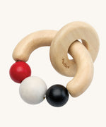 PlanToys Beads Rattle in a High Contrast colourway. PlanToys range of toys are made from sustainably sourced rubberwood, we're proud stockists of PlanToys here at Babipur. 
