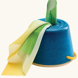 Group of babies playing with sensory toys including the tissue box
