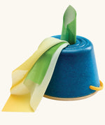 Group of babies playing with sensory toys including the tissue box
