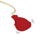 A close up of the squeaky pump on the blood pressure toy from the PlanToys Doctor Set.