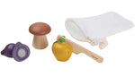 The veggie play food set from PlanToys includes a wooden bell pepper