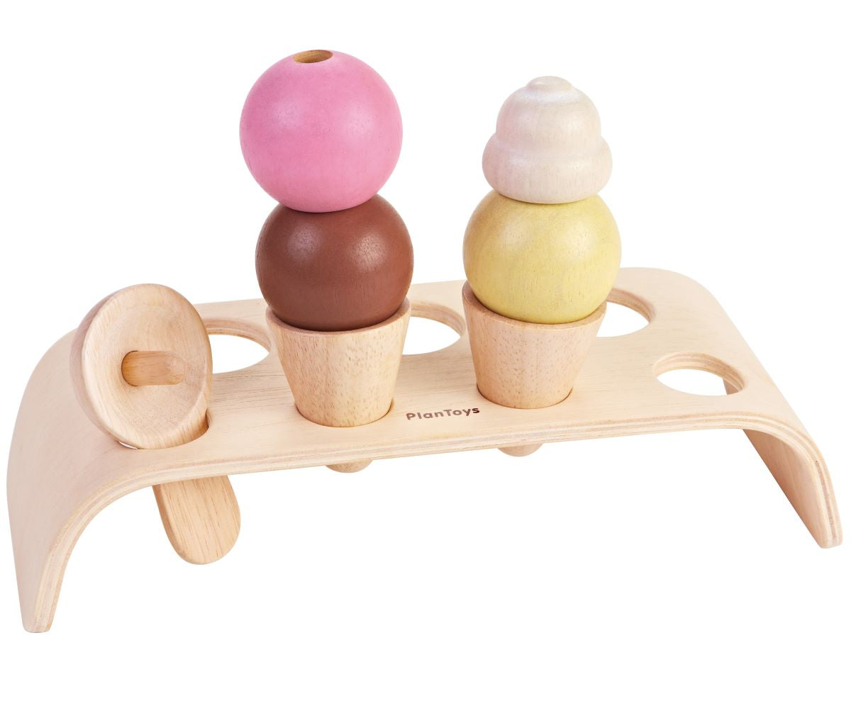 The PlanToys Ice Cream play food set includes a wooden serving tray to hold the two cones