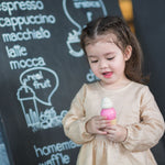 The PlanToys Ice Cream play food set includes a wooden serving tray to hold the two cones