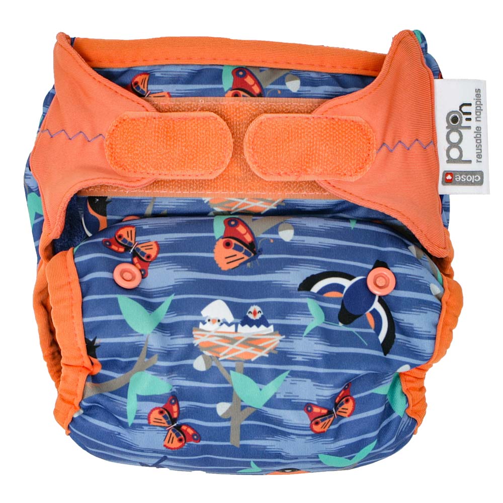 The Close Parent Pop-in reusable nappy wrap cover with velcro closures, in a twilight garden print