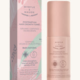 Pink with green leaves hair growth tonic box and a pink bottle on a cream background. 