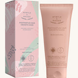 Pink with green leaves postpartum hair growth mask box and a pink tube on a cream background.