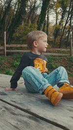 Short video showing the Froddo barefoot kids f motion tex shoes in mustard worn by a child