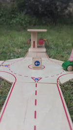Beck Holzspielzeug Wooden Roundabout Junction for Toy Cars with a sign post and 4 road exits.